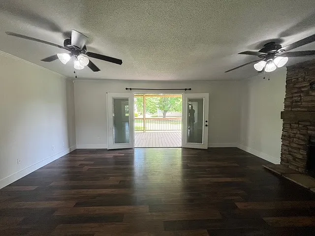 Living with view with French doors opened up