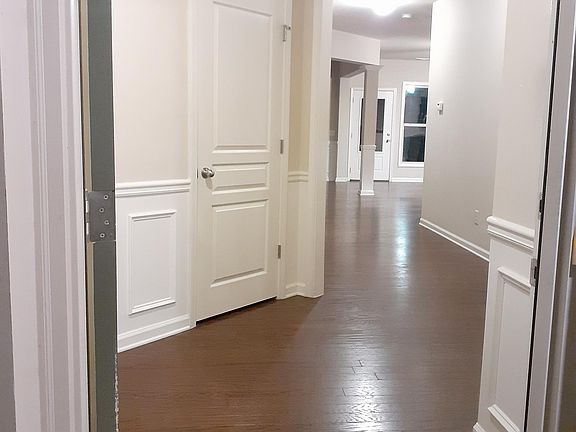 Foyer, Closet and Walkway to Living, Kitchen & Dining