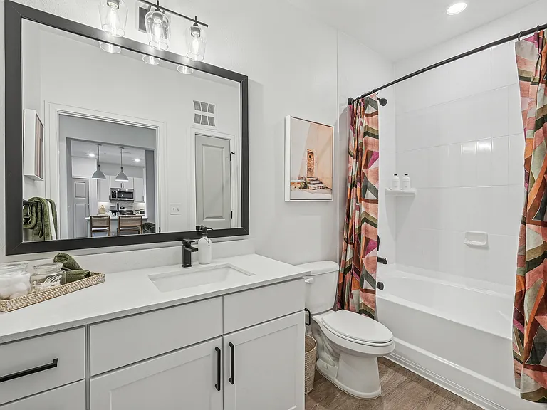 Bathroom with Quartz Countertop and Soaking Tub