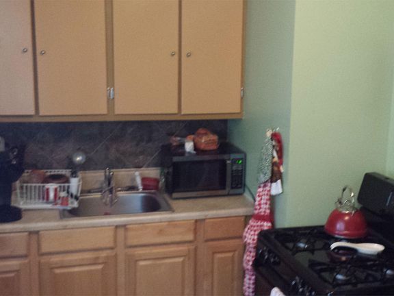 The kitchen comes with a gas range, which was new in 2012.