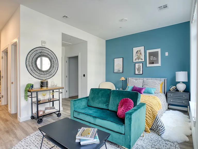 Step into the stylish interiors of Hamilton Crossing Apartments, where modern design meets comfort. This inviting living space features vibrant decor and thoughtful details for everyday living. Explore your new home today!