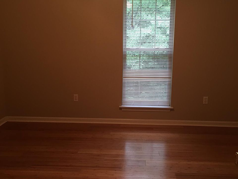 One bedroom on the main floor that can be used as a third bedroom or office space. Two bedrooms upstairs.