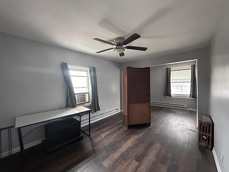 Big master bedroom with new flooring and paint