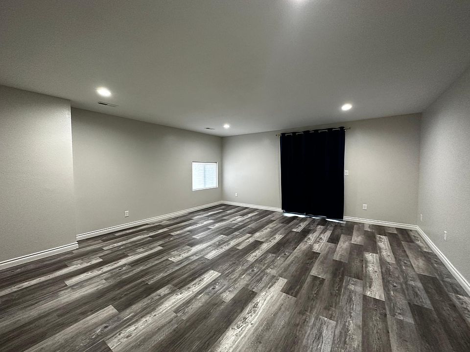 Basement Room. Could be a man cave, play room, or movie room.