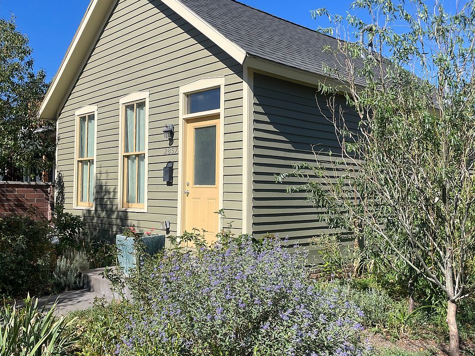 Curtis Park Garden Cottage. Single family home surrounded by lovely garden.