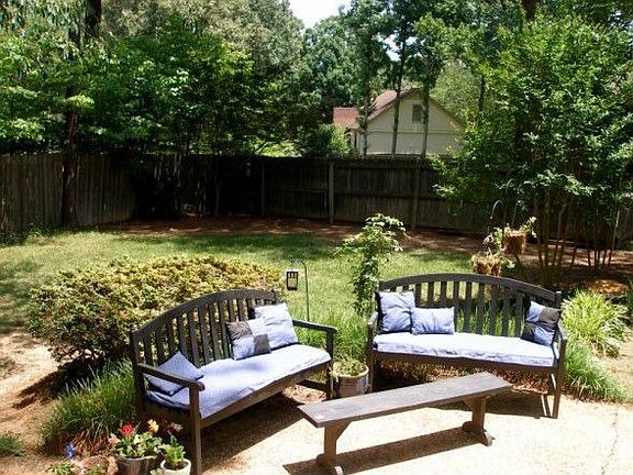 Fenced backyard is private and level