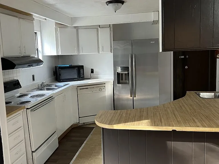 living room into kitchen