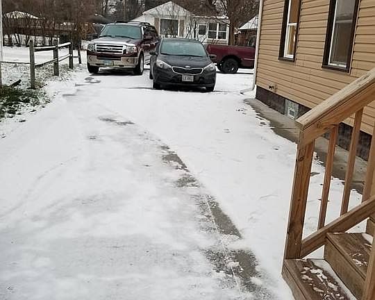 View of driveway from back y