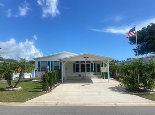 406 Macadamia Dr, Barefoot Bay, FL 32976