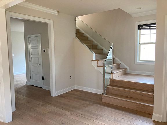 Stairs with modern glass railing
