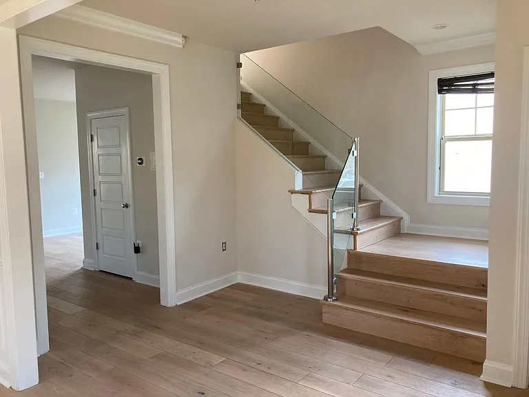Stairs with modern glass railing