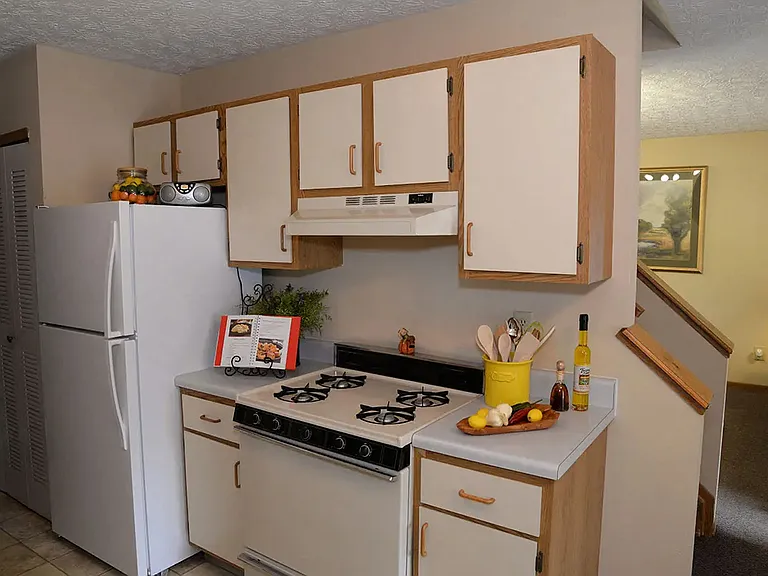 Bright kitchen with white appliances