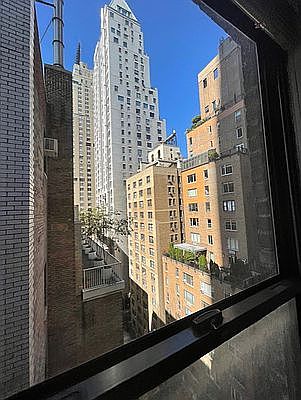 4th image of 117 W 58th St APT 12A
