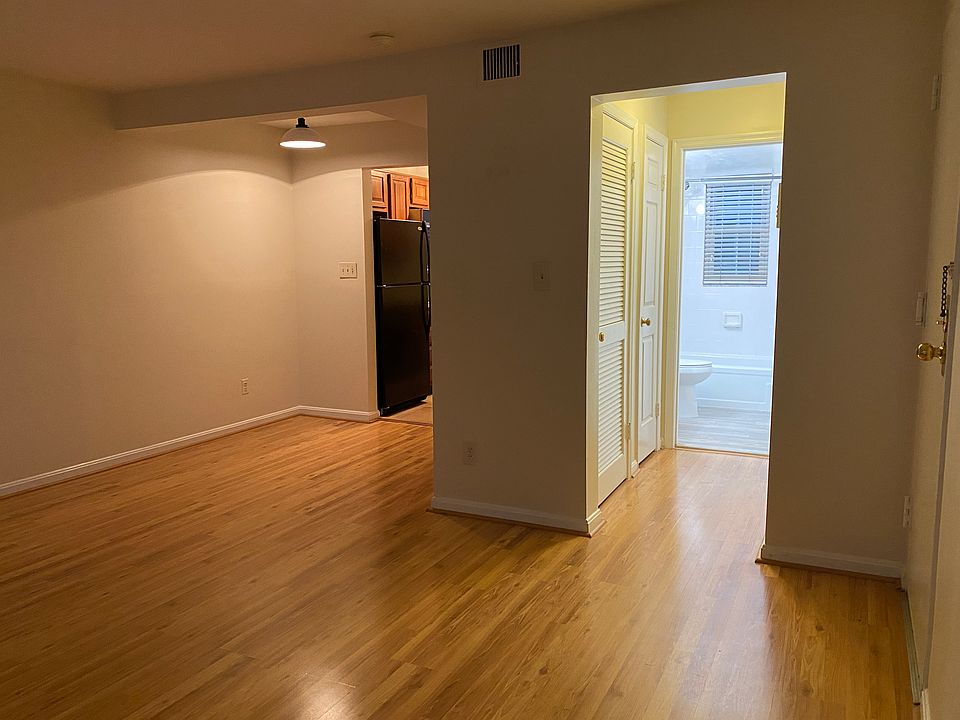 Looking into dining area and bathroom