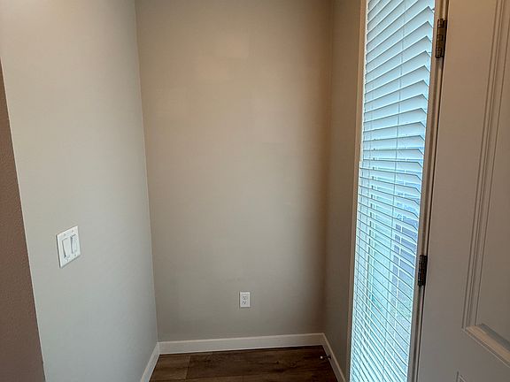 Storage alcove just off of the front door.