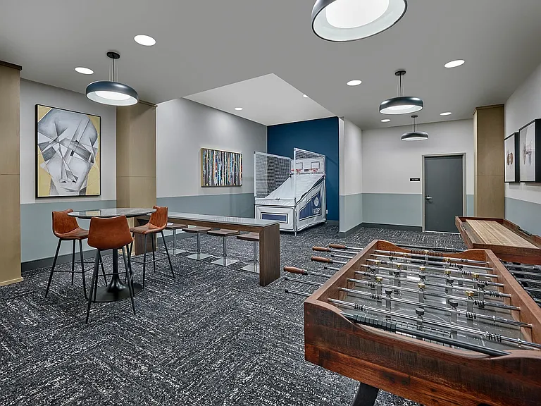 Experience leisure and fun in this chic entertainment lounge, designed for ultimate relaxation.