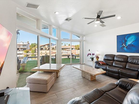 House expanded 400 sf for Family Room overlooking the lake. 10 ft high vaults.