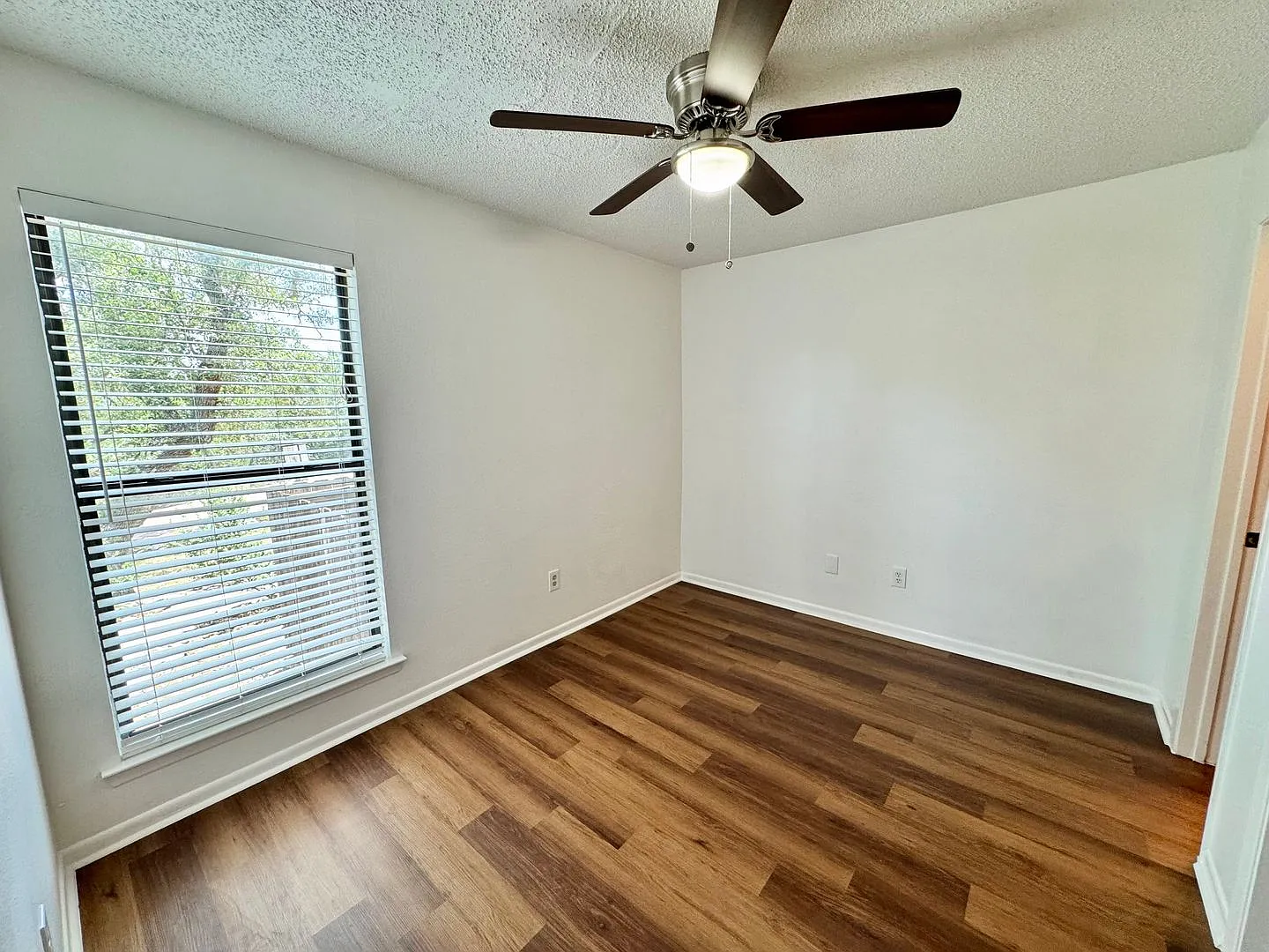 Move-In Ready Townhome with Thoughtful Multi-Level Design And NEW Flooring! — Photo 4