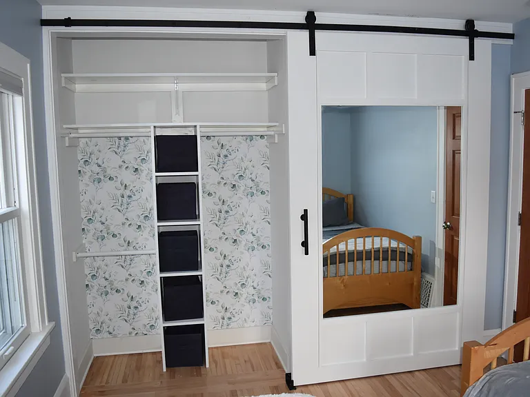 Main floor secondary bedroom closet