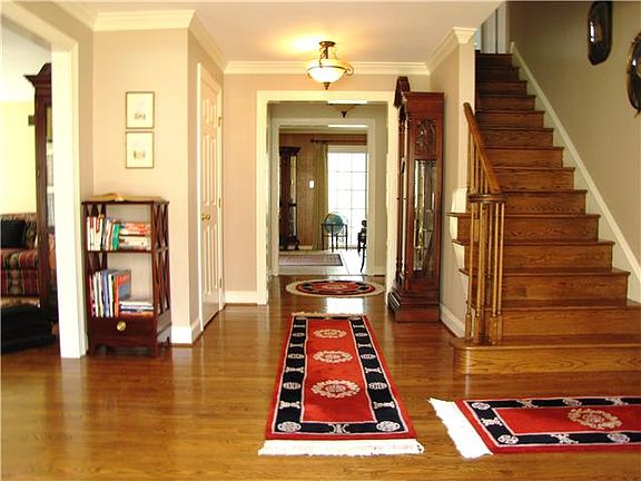 Elegant, wide Center Hall with Crown Moulding