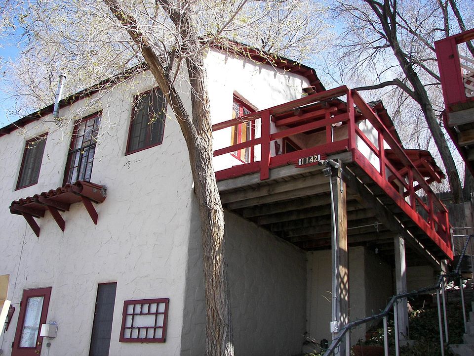 Front of house with side deck
