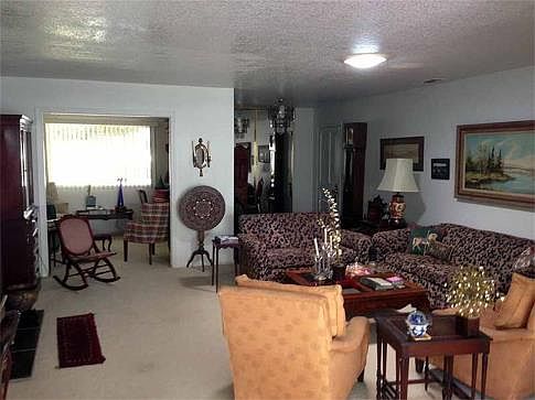 Living room looking at den