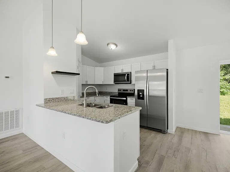 6488 NW 13th Ave — Photo 4