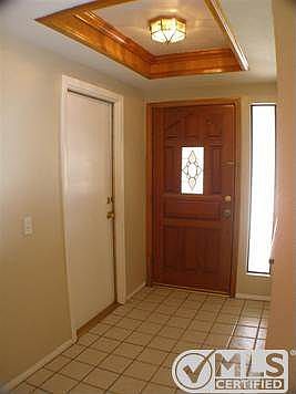 Entry way, the door to the left goes into the garage.