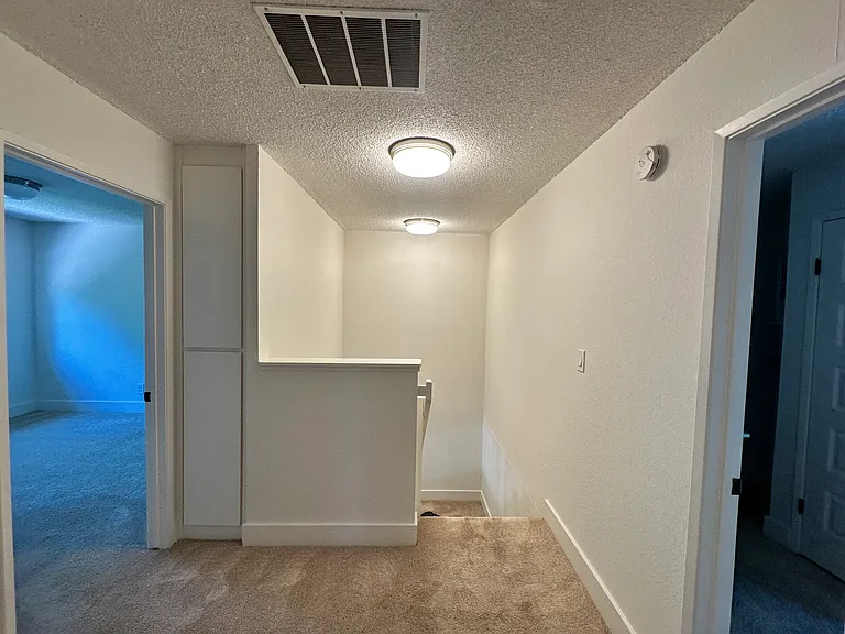 Landing area in 2nd floor leads to the 3 bedrooms and a full bath
