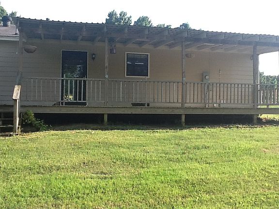Back of house facing lake
