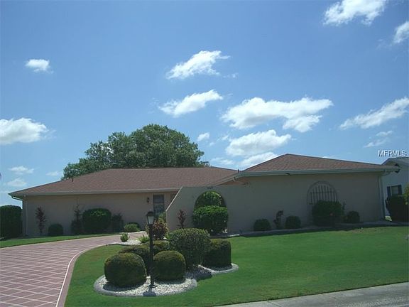 VIEW FROM STREET WITH BEAUTIFUL LANDSCAPING