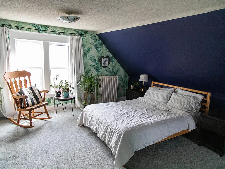 Huge bedroom 4 on converted third floor! Also has views of downtown Minneapolis.