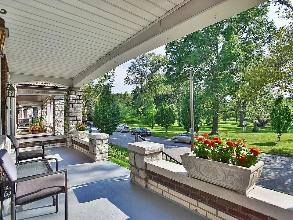 Spacious front porch w/ park views