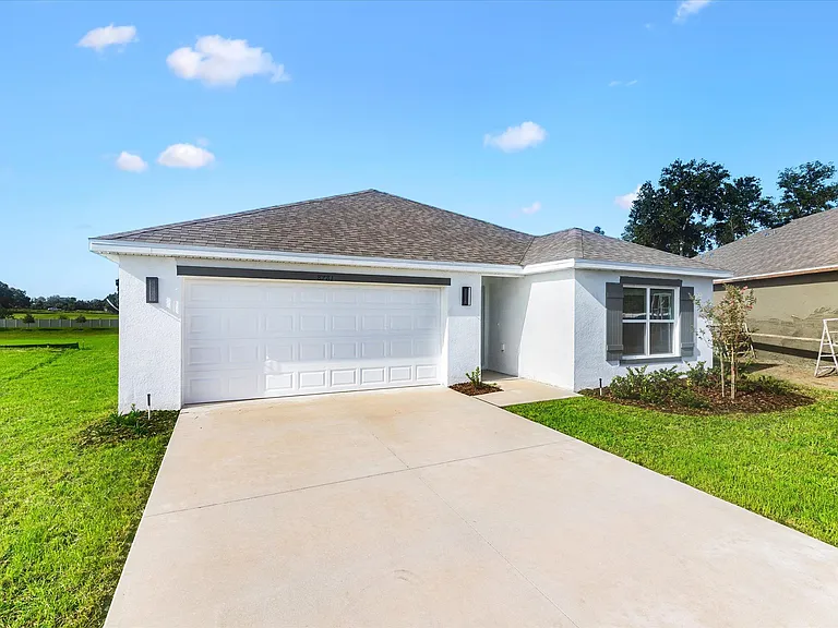 Two-car garage and long driveway