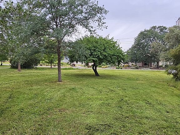 Side yard looking towards Carriage Drive