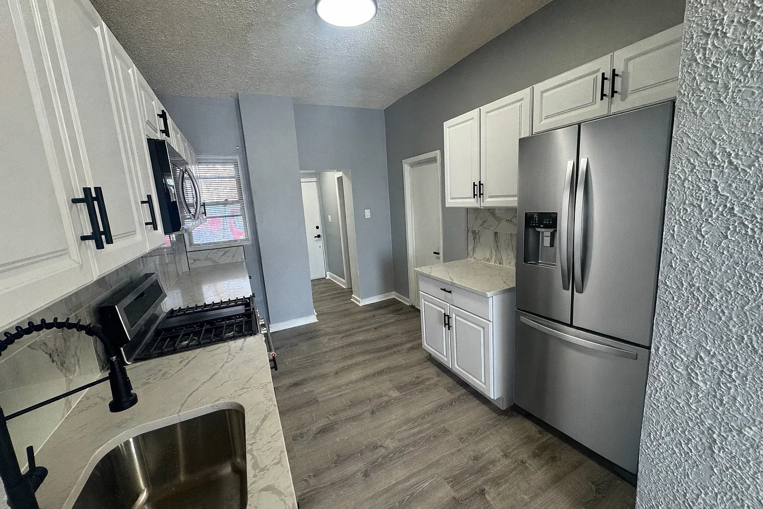 4 bed, 1.5 bath, 1566 sqft, $1,900 — Photo 1