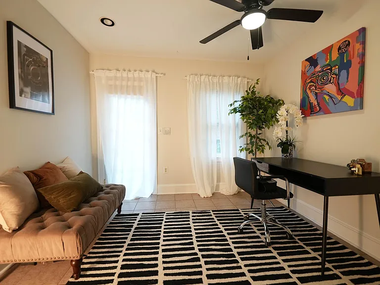 3rd bedroom with door to the outdoor patio