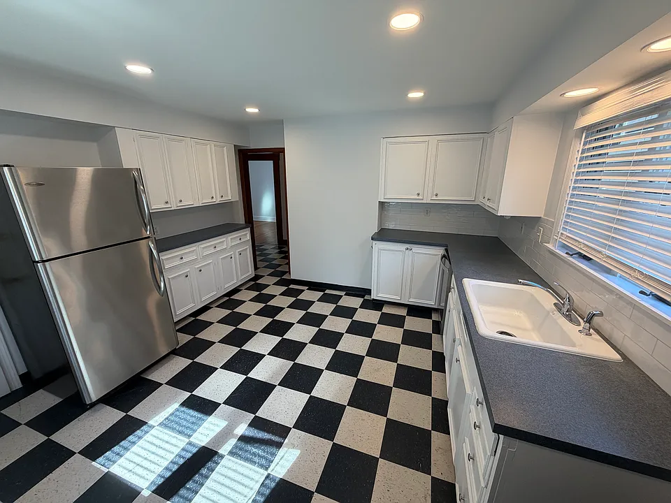 Large built-in hutch next to the refridgerator.