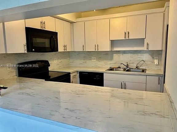 2nd image of 9450 Live Oak Pl APT 208