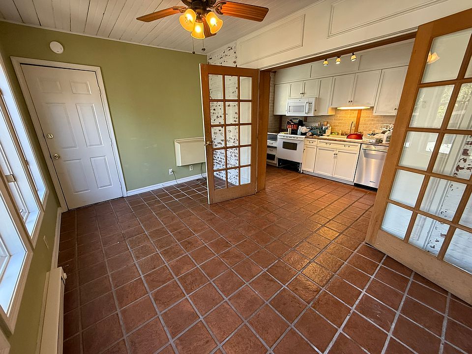 Dining Room/Sunroom and Kitchen, with rear entry