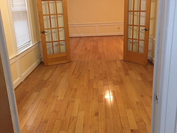 ENTER INTO MASTER BEDROOM WITH FRENCH DOORS