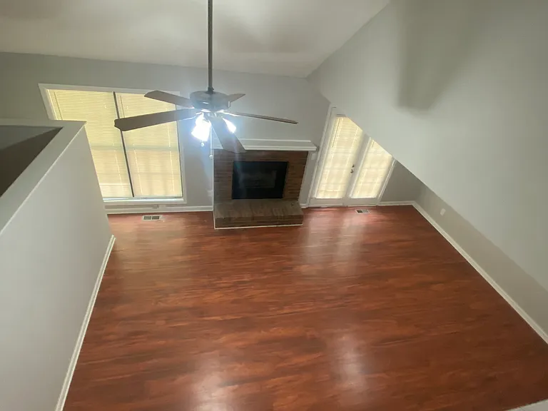 Den from upstairs landing.