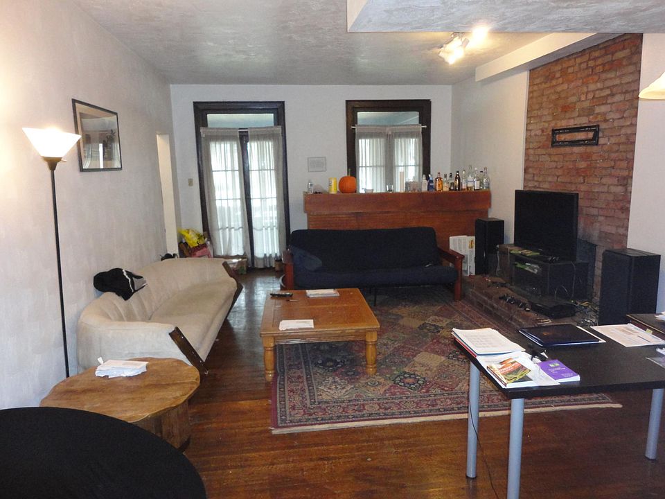 Living area going out to sunroom.