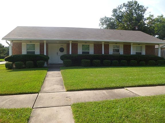 Front View of Home. Front Porch all along front of the Home. Corner Lot.