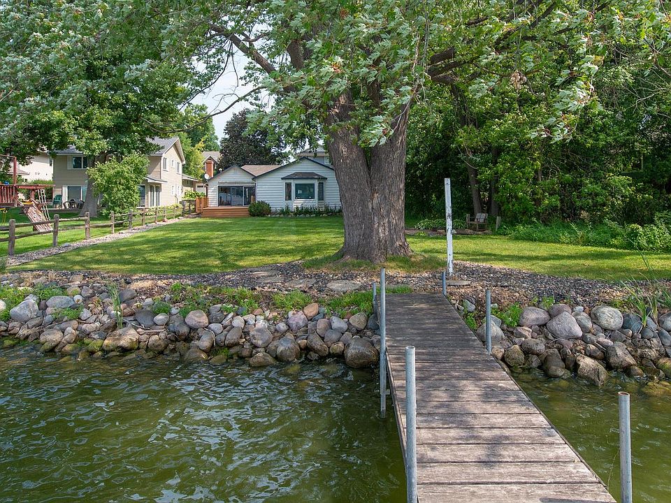 Perfectly flat backyard. Great swimming right off the dock