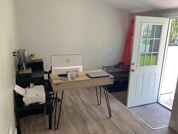 Office Room with back entrance.