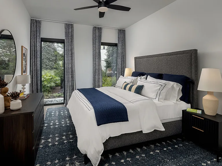 Spacious bedrooms with large windows and natural light