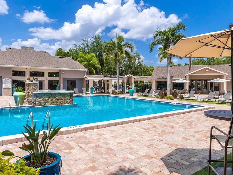 Whether you're soaking in the sun or relaxing in the shade, our beautifully landscaped pool area offers the ultimate escape from the Florida sun.