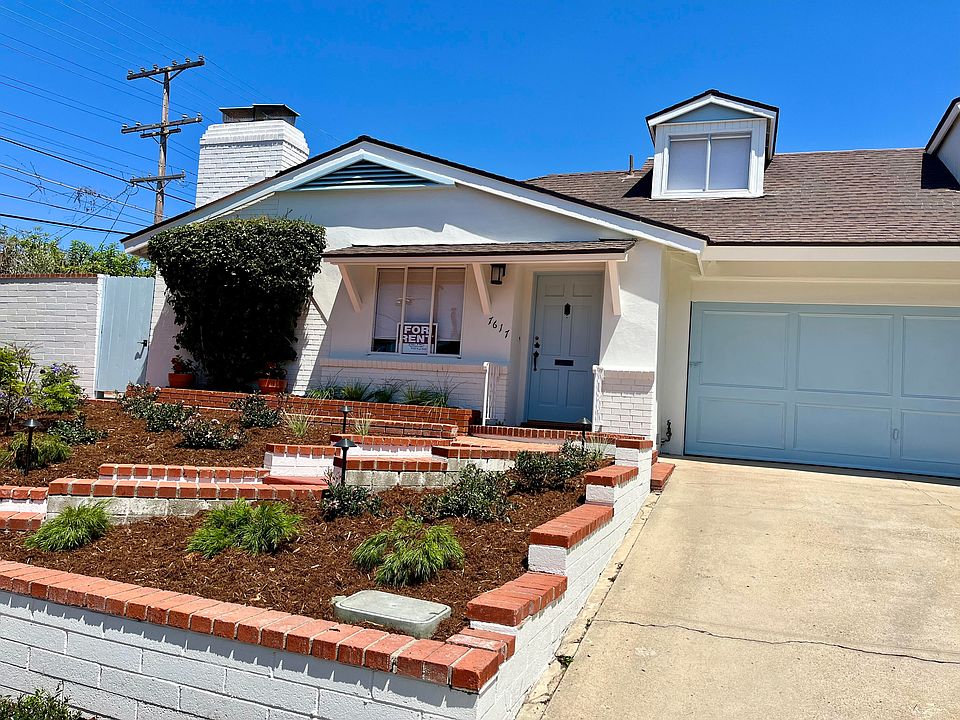 All new front yard landscaping with sprinklers and custom lighting