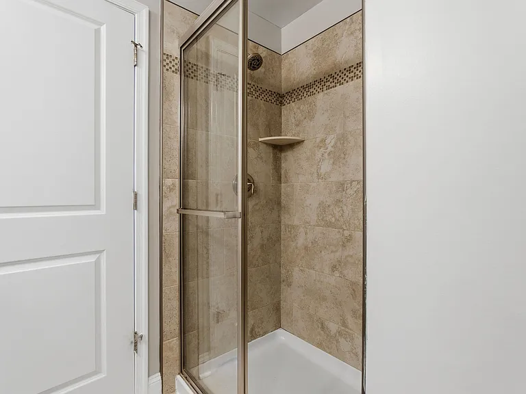 3rd-floor primary bedroom full bathroom